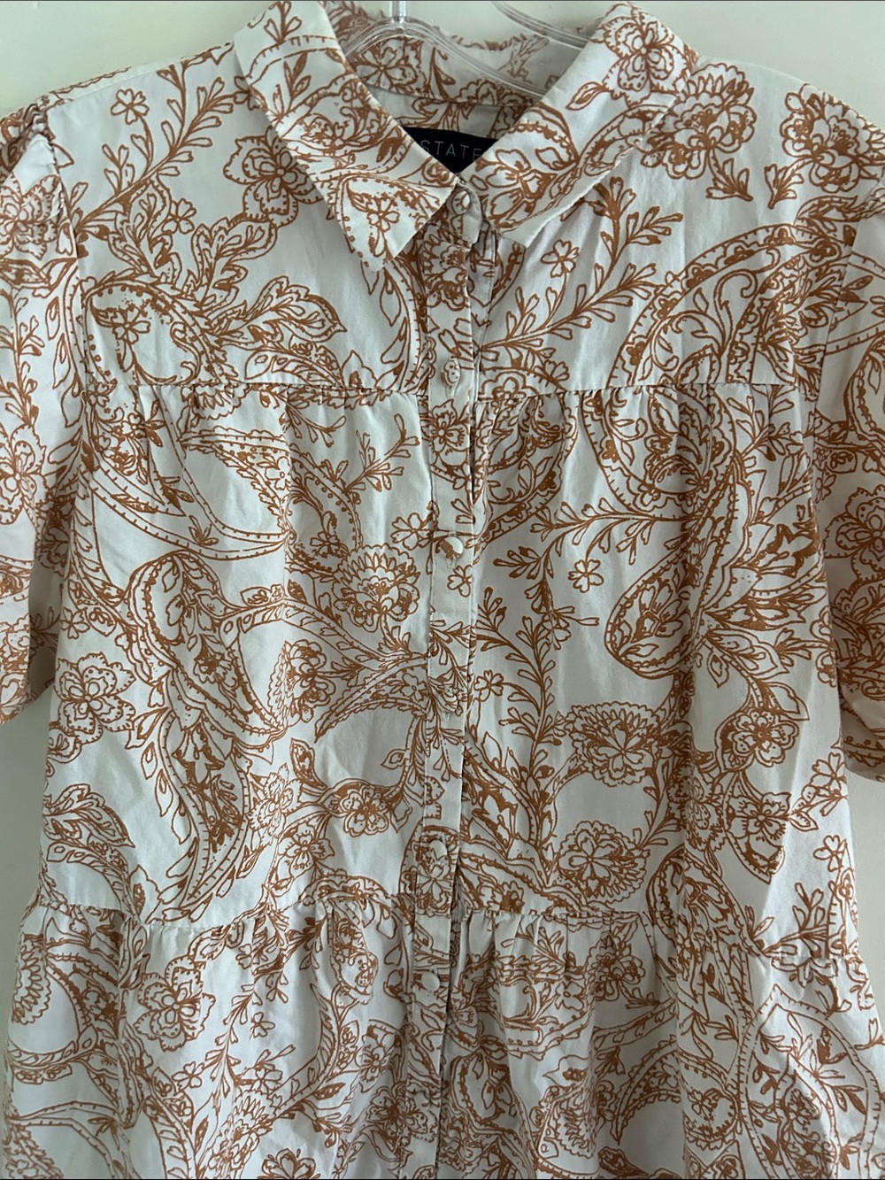 1. STATE dress is a brown and white paisley print mini dress with puff sleeves - Picture 2 of 3